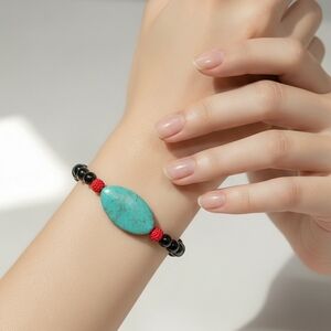 Elegant Turquoise and Black Tourmaline Beaded Bracelet With Metal Flower Spacers